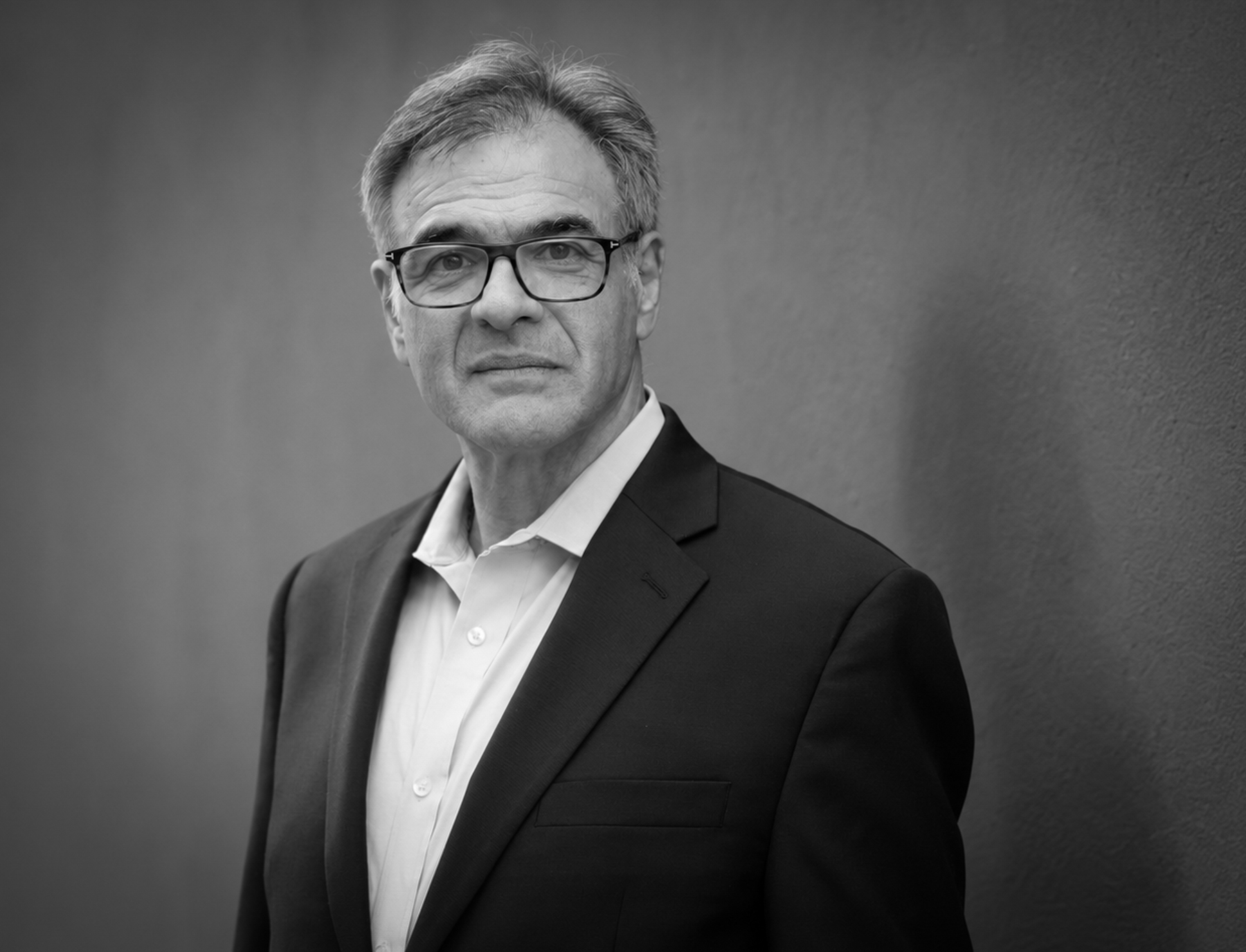 Black and white portrait of John Kiriakou